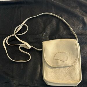 Carlos Falchi ivory crossbody. Genuine leather.